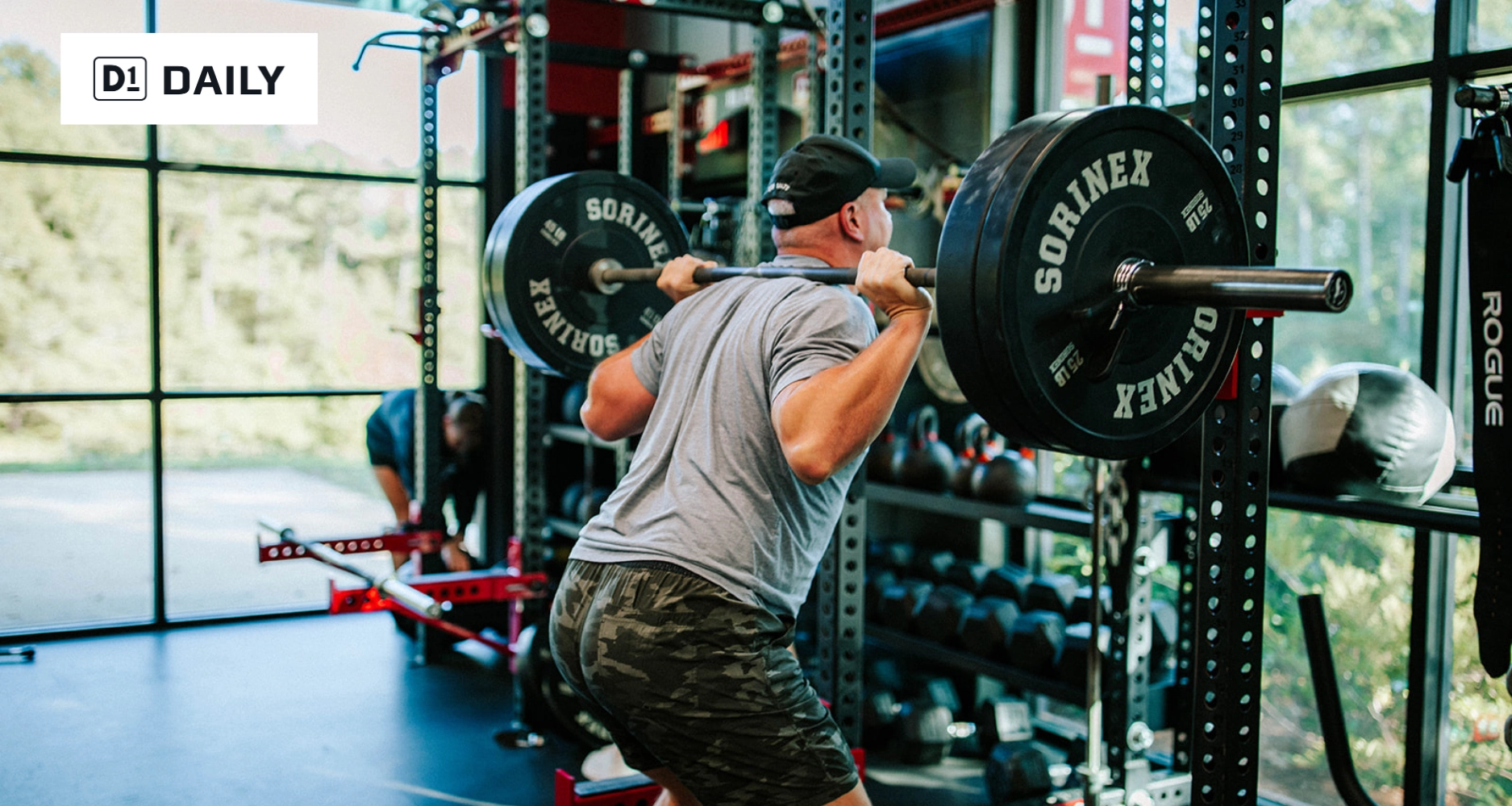 Man squatting weights